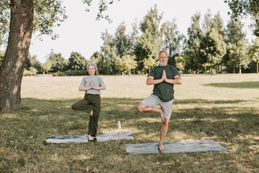 man meditating in a park
