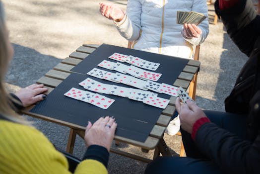 group of friends playing cards