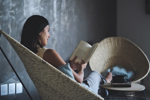 a person reading in a cozy chair